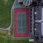 aerial photo of green and red sports field